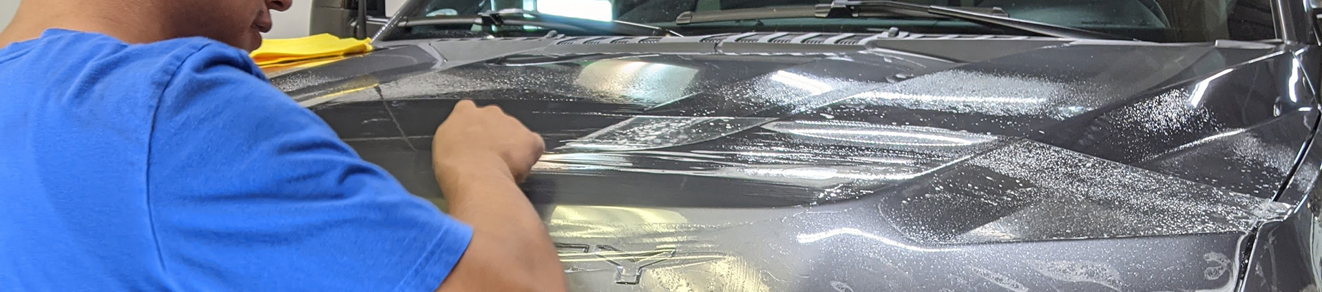 denver technician installing a paint protection film
