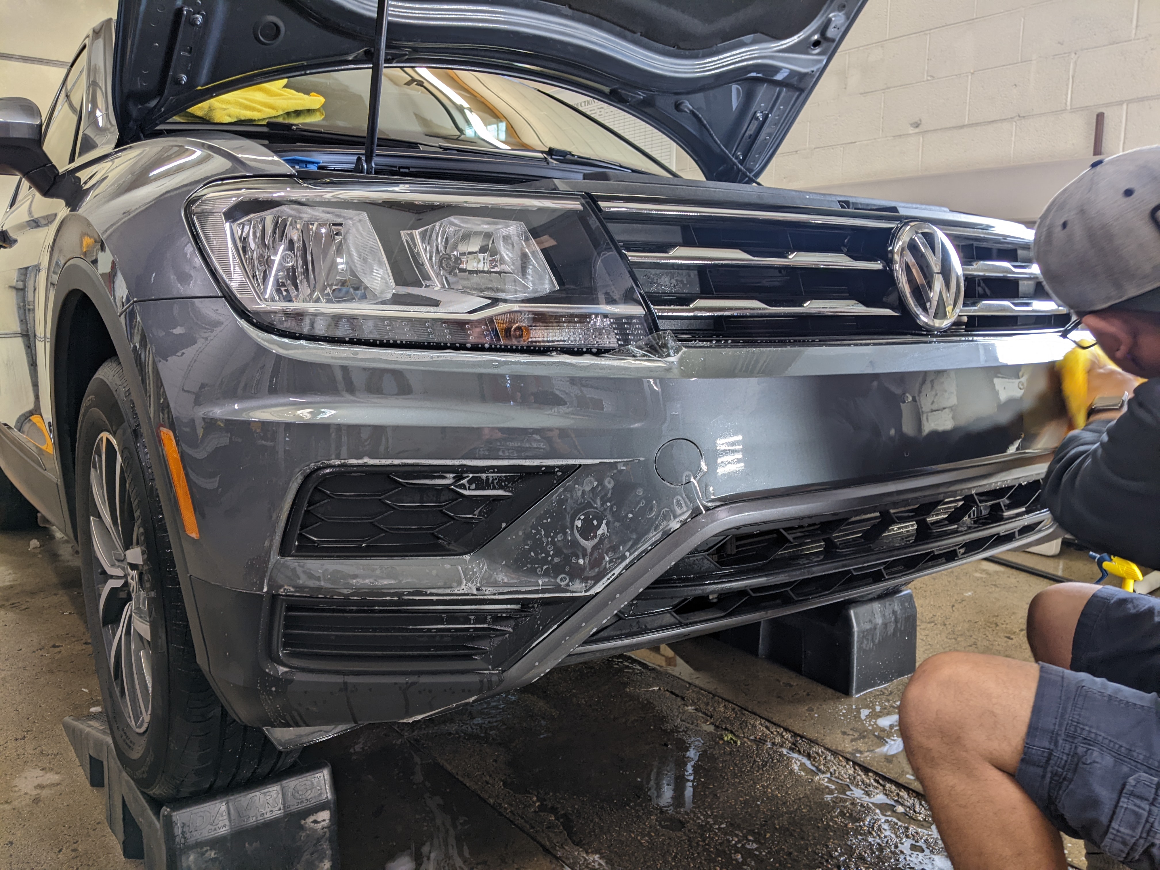 2019 Volkswagen Tiguan. Getting started with the full pre-cut PPF front bumper. 