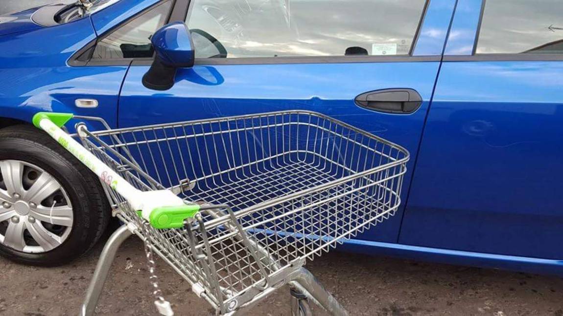 car dent from shopping cart
