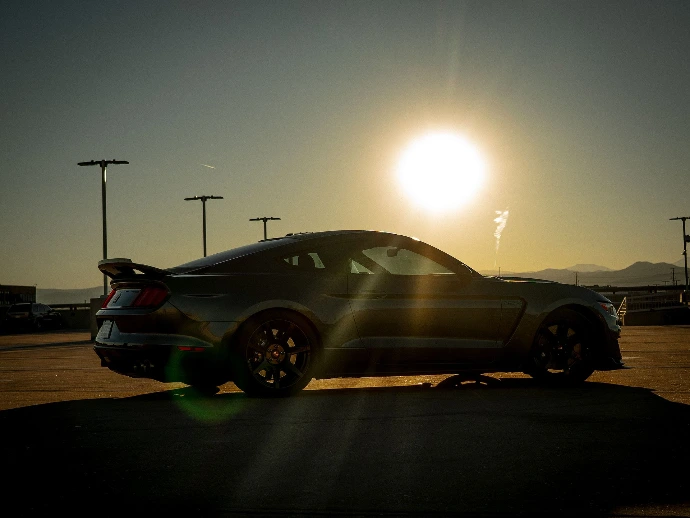 2018 Ford Mustang Shelby parked with sun in the background