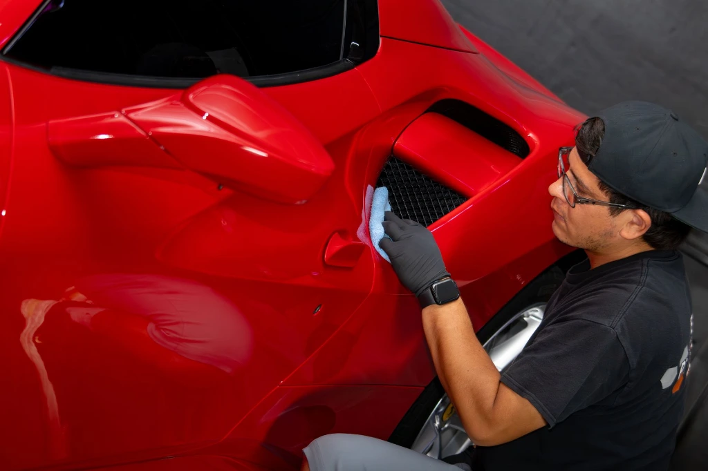 Professional application of ceramic coating on a 2018 Ferrari 488 Spider at Pro-Tech Auto Shield