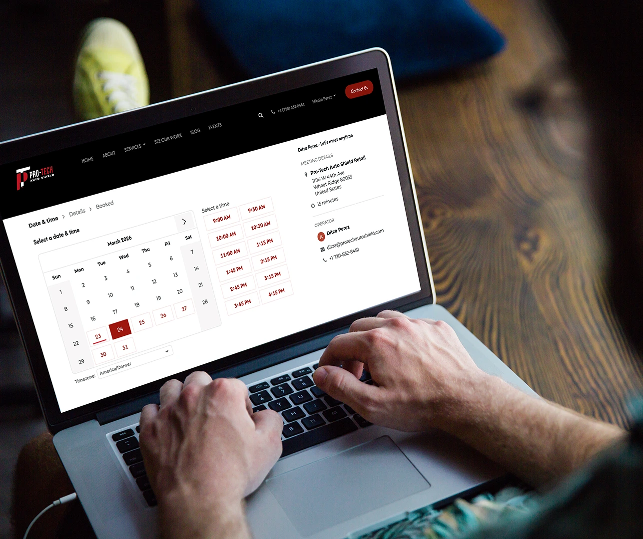 Person browsing Pro-Tech Auto Shield Calendar page