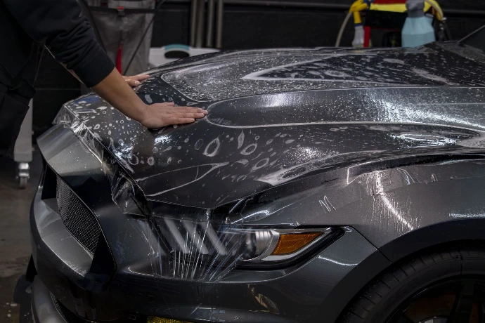 Professional paint protection film application on a 2018 Ford Shelby GT350 back bumper at Pro-Tech Auto Shield in Wheat Ridge