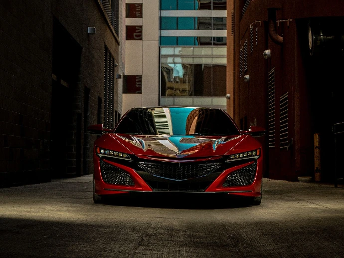 Valencia Pearl Red 2021 Acura NSX parked in between Denver alley